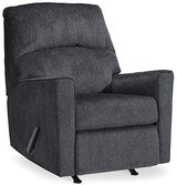 Ashley Furniture Altari recliner in beige fabric, showing plush cushioning and wooden base with armrests and reclining mechanism.