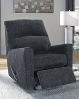 Ashley Furniture Altari recliner in beige fabric with plush cushioning and wooden legs, showcasing a comfortable living room seating option.