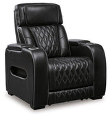 Ashley Boyington Power Recliner in brown fabric, showing plush cushioning and built-in reclining mechanism.