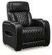 Ashley Boyington Power Recliner in brown fabric, showing plush cushioning and built-in reclining mechanism.