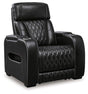 Ashley Boyington Power Recliner in brown fabric, showing plush cushioning and built-in reclining mechanism.