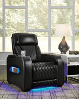 Boyington Power Recliner by Ashley Furniture, showing a comfortable gray recliner with padded armrests and plush cushioning.