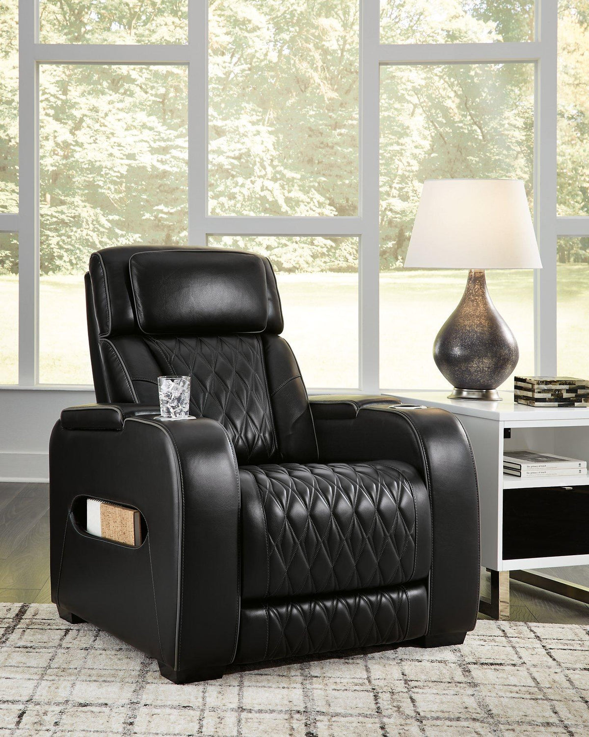 Boyington Power Recliner by Ashley Furniture, showing plush fabric upholstery and smooth reclining mechanism.