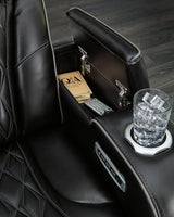 Boyington Power Recliner by Ashley Furniture, showing plush upholstery and adjustable reclining mechanism in a modern living room setting.