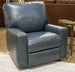 Ashley Furniture Torino manual rocker recliner chair with cushioned armrests and plush fabric for comfortable seating.