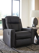 Ashley Furniture Mackmenville recliner in neutral fabric, showing plush cushioning and classic design from a front angle.
