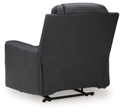 Ashley Furniture Mackmenville recliner with plush fabric upholstery and padded armrests, shown from the back in the image.
