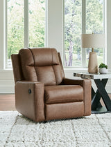 Ashley Furniture Mackmenville recliner in plush fabric with padded armrests, shown in a closed position.