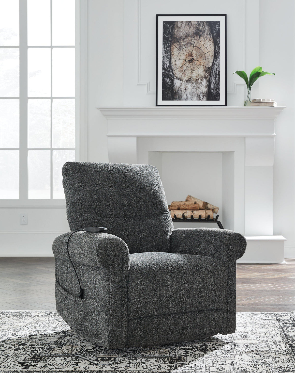 Ashley Furniture Aureta Power Lift Recliner in beige fabric, featuring plush cushioning and a sturdy frame for comfortable relaxation.