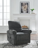 Ashley Furniture Aureta Power Lift Recliner in beige fabric, featuring plush cushioning and a sturdy frame for comfortable relaxation.
