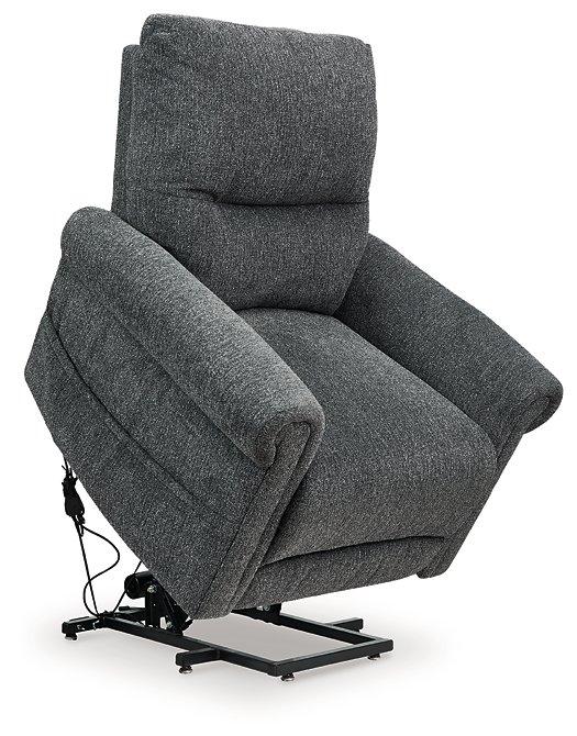 Ashley Furniture Aureta Power Lift Recliner in neutral fabric, featuring plush cushioning and a sturdy wooden base.