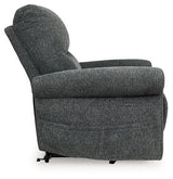 Ashley Furniture Aureta Power Lift Recliner showing plush upholstery and adjustable reclining features in a modern living room setting.