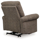 Ashley Furniture Aureta Power Lift Recliner in beige fabric with plush cushioning and a built-in lift mechanism.