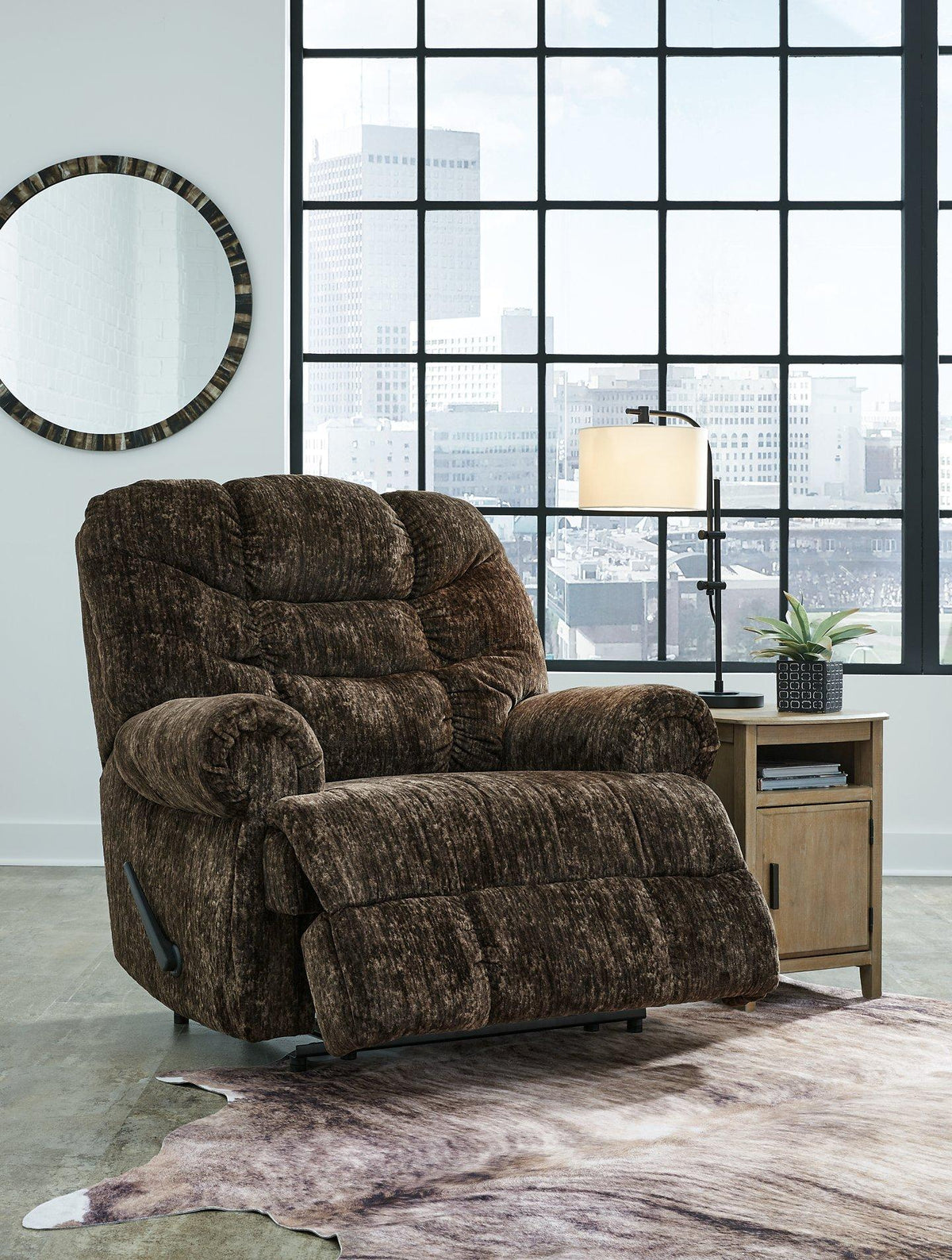 Ashley Furniture Movie Man recliner in plush fabric, showing its comfortable design and sturdy frame for home theater or living room use.
