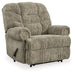 Ashley Furniture Movie Man Recliner showing plush fabric upholstery and padded armrests in a cozy living room setting.