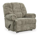 Ashley Furniture Movie Man recliner showing plush upholstery and adjustable reclining mechanism in a modern living room setting.