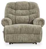 Ashley Furniture Movie Man Recliner showing plush brown upholstery and padded armrests, perfect for comfortable home theater seating.