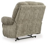 Ashley Furniture Movie Man Recliner showing plush brown fabric and padded armrests, perfect for comfortable home theater seating.