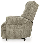 Comfortable Movie Man recliner by Ashley Furniture, showcasing plush upholstery and a reclining mechanism for relaxed movie nights.