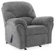 Ashley Furniture Allmaxx recliner featuring plush upholstery, padded armrests, and a reclining mechanism for comfort.