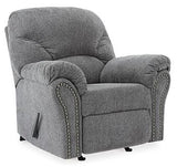 Ashley Furniture Allmaxx Recliner in beige fabric with plush cushioning and wooden armrests, designed for comfortable seating.