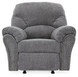 Comfortable Ashley Furniture Allmaxx recliner with plush cushions and dark upholstery, perfect for relaxing in any living room.