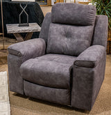 Ashley Furniture Brysonview recliner with plush cushions and wood legs, shown in a closed position for comfortable lounging.