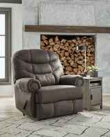 Ashley Furniture Camera Time Recliner, plush fabric recliner chair with padded armrests and built-in cup holders for comfort.