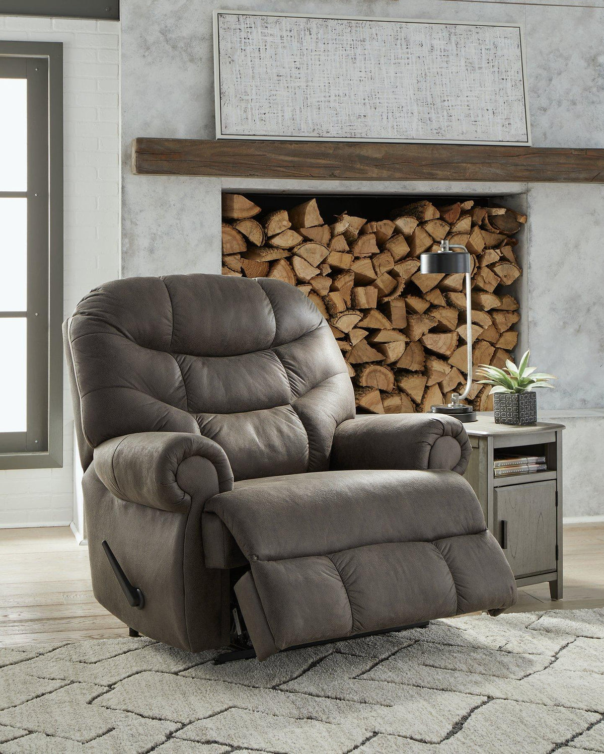 Ashley Furniture Camera Time Recliner in plush fabric, showcasing a comfortable recliner with padded armrests and a modern design.
