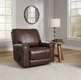 Comfortable Ashley Furniture Colleton recliner with plush upholstery and padded armrests, perfect for relaxing in any living room.