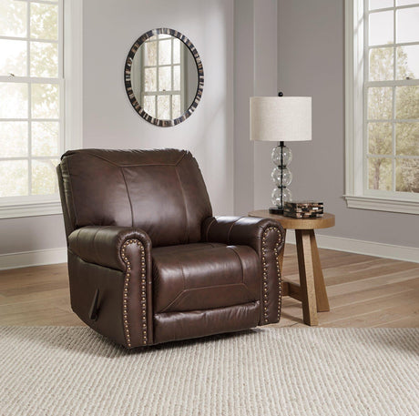 Comfortable Ashley Furniture Colleton recliner with plush upholstery and padded armrests, perfect for relaxing in any living room.