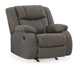 Comfortable First Base recliner by Ashley Furniture with cushioned armrests and plush upholstery for relaxed seating.