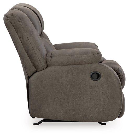 Comfortable Ashley Furniture First Base Recliner with plush fabric and padded armrests, ideal for relaxing in a modern living room.