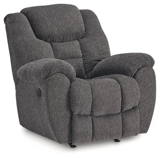Ashley Furniture Foreside recliner showing plush fabric, cushioned armrests, and a comfortable reclining position.