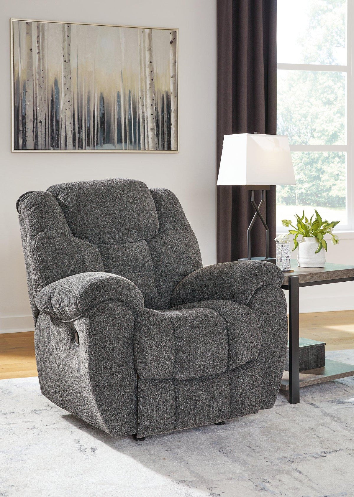 Ashley Furniture Foreside Recliner with plush cushioning and wooden legs, perfect for comfortable living room seating.