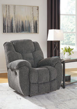 Ashley Furniture Foreside Recliner with plush cushioning and wooden legs, perfect for comfortable living room seating.