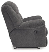 Ashley Furniture Foreside recliner showing a plush, comfortable upholstered armchair with a classic design and neutral fabric.