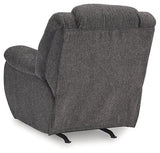 Ashley Furniture Foreside Recliner shown in a cozy living room with plush upholstery and a classic recliner design.