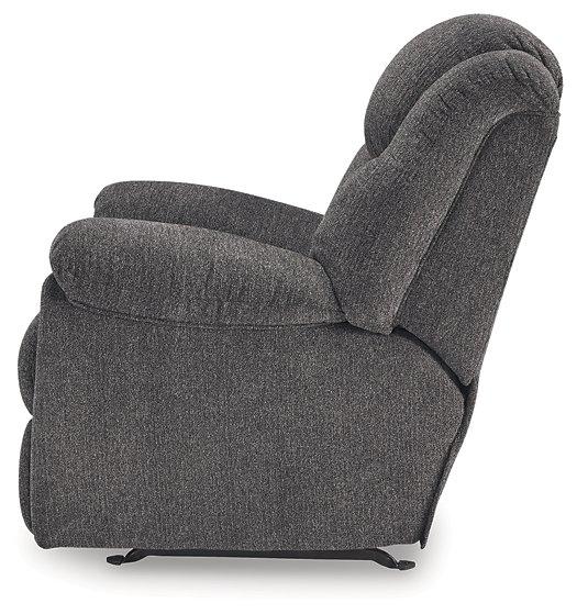 Ashley Furniture Foreside recliner with plush cushioning and wooden legs, designed for comfort and stylish living room seating.