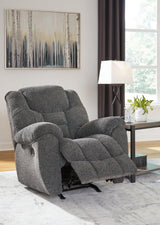 Comfortable Ashley Furniture Foreside Recliner with plush upholstery and padded armrests, perfect for relaxing in the living room.