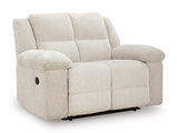 Ashley Furniture Orlen oversized recliner in dark brown fabric, showing a side view with plush cushions and wide armrests.