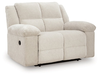 Ashley Furniture Orlen oversized recliner in brown fabric, shown from an angled closed position with plush cushioning