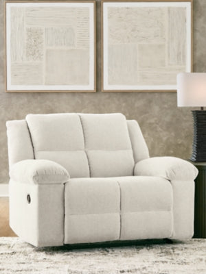 Ashley Furniture Orlen oversized recliner in rich fabric, showing the plush seat, wide armrests, and modern design.