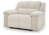 Ashley Furniture Orlen oversized recliner in neutral fabric, shown in a closed, angled view highlighting plush cushioning and wide armrests.