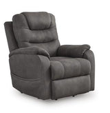 Ashley Furniture Snowfield Power Lift Recliner with plush upholstery and ergonomic design, shown in a modern living room setting.