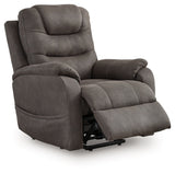 Ashley Furniture Snowfield Power Lift Recliner shown in an open position with plush cushioning and a neutral fabric upholstery.