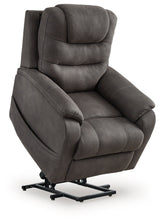 Ashley Furniture Snowfield Power Lift Recliner in beige fabric, showing the reclined position with padded armrests and plush cushioning.