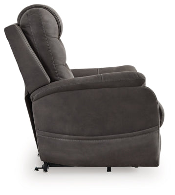 Ashley Furniture Snowfield Power Lift Recliner in beige fabric with padded armrests and built-in control for easy reclining.