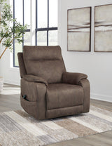 Ashley Furniture Crestmeade Power Lift Recliner with plush upholstery and padded armrests, designed for comfort and easy reclining.