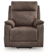 Ashley Furniture Crestmeade Power Lift Recliner in plush fabric with a padded backrest and armrests, designed for comfort and support.